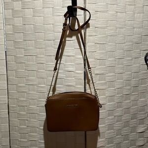 Michael Kors shoulder bag with gold accents never used with matching wallet